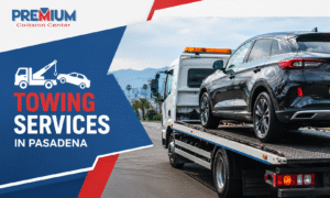 Tow truck transporting accident vehicle to Premium Collision Center Pasadena
